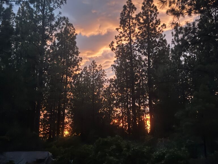 Sunset & thunderstorm by our home.